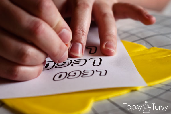 lego-head-cake-tutorial-marking-logo